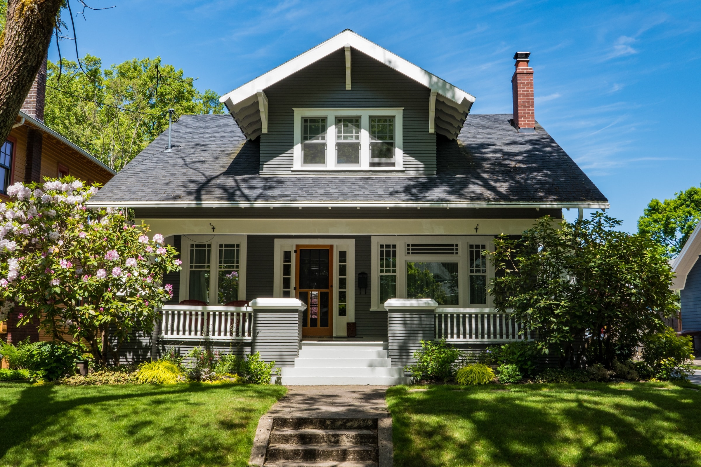 Portland, OR House With Green Plants And Yard