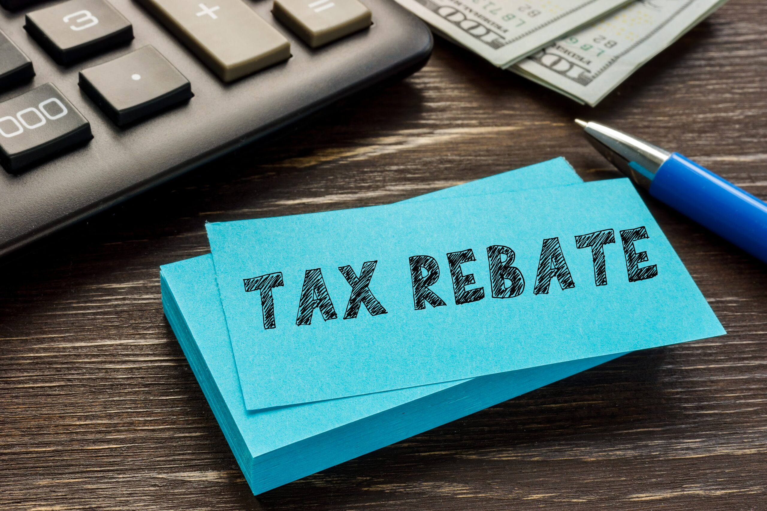 Business,Concept,About,Tax,Rebate,With,Inscription,On,The,Piece post it note that reads: tax credit